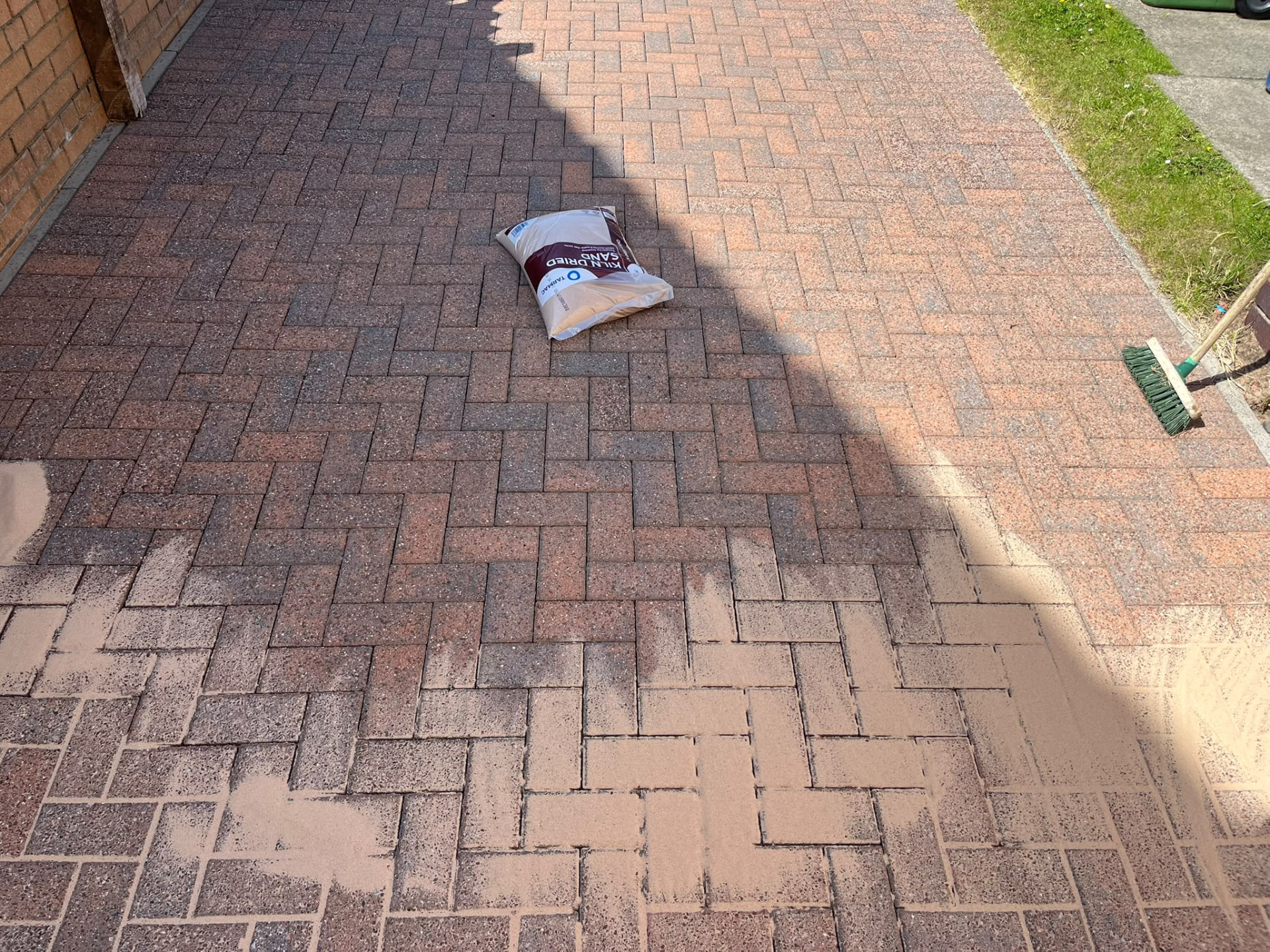 Block paving mid re-sand after cleaning
